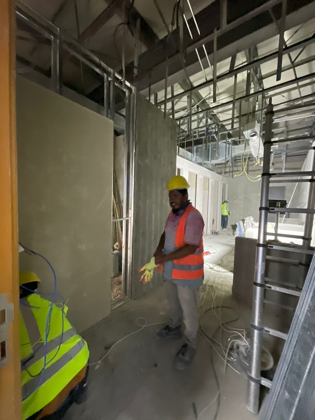 Office fit-out Riyadh – Plumbing installation during bathroom renovation